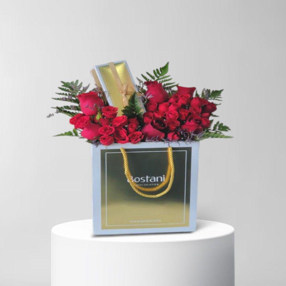 باقة بستاني مع بيبي جوري أحمر 🍫🌹