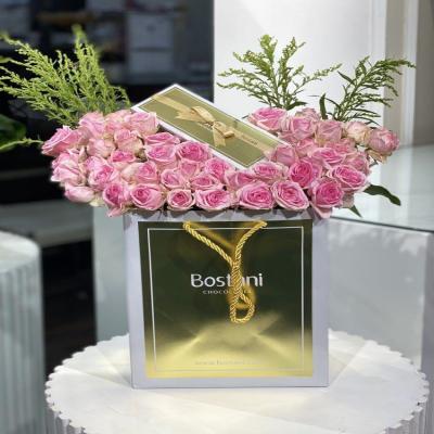 باقة بستاني مع بيبي جوري وردي 🌸🍫