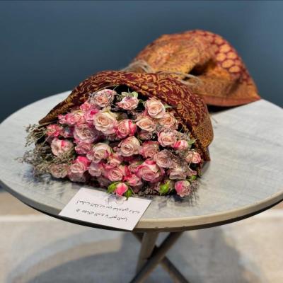 باقة الدفء الوردي 🌸🧣